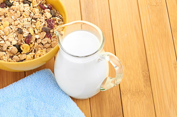 Delicious and healthy cereal in bowl with milk