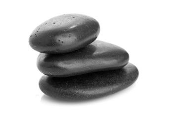 Growing piled up pebbles on a white background