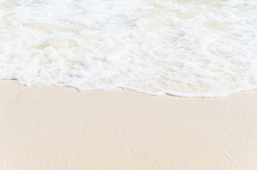 Fototapeta na wymiar Sea wave and sand using as background