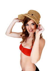 Bikini girl with straw hat.