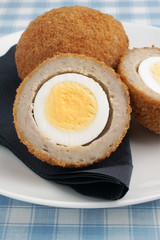 Scotch eggs a hard boiled egg wrapped in sausage meat and breadcrumbs