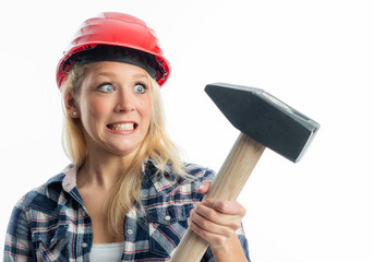 Weiblicher Handwerker mit Vorschlaghammer