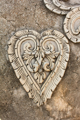 heart in Thai stucco of north thailand