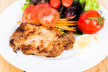 Grilled beef steak with salad