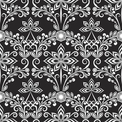 Seamless black and white floral wallpaper pattern.