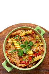 Fried pasta with pork ham and paprika