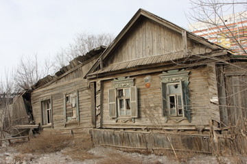 Deserted and a broken old wooden house in the city