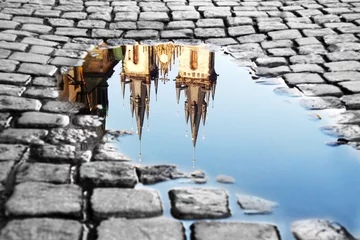 Tuinposter Puddle on the Old Town Square © janacer