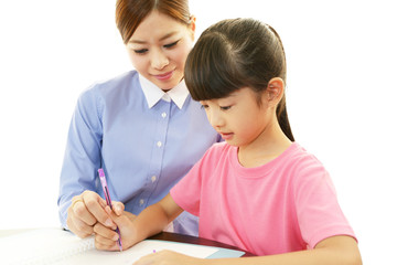 笑顔の女の子と女性教師