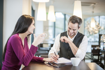 creative team at work in a cafe