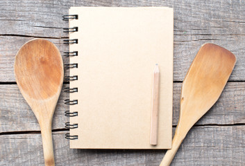 Old paper and wooden spoon - menu concept