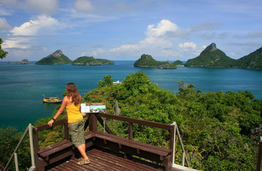 Fototapeta na wymiar Young woman standing at overlook, Mae Koh island, Ang Thong Nati
