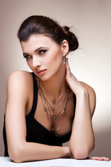 fashion model posing in exclusive jewelry. Professional makeup