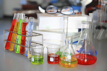 the laboratory test tubes with colorful liquid