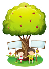 Kids under the tree with empty signboards
