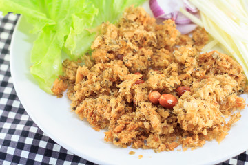 Thai style , crispy fries catfish with mango and onion salad