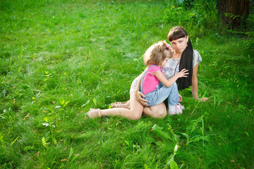 Fototapeta premium Young mother with child