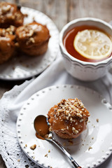 Muffins with caramel frosting and nuts