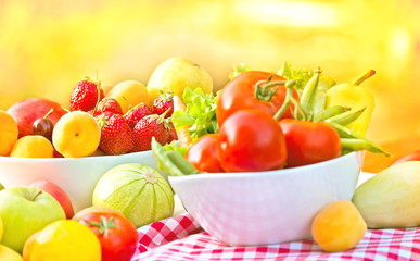 Obraz na płótnie Canvas Fresh fruits and vegetables on a table