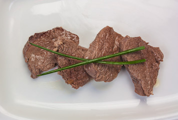 Juicy slices of roast beef
