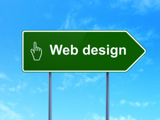 Web development concept: Web Design and Mouse Cursor on road