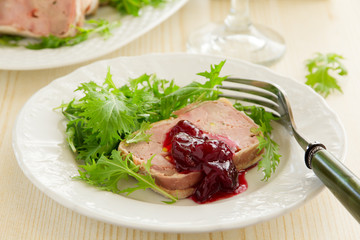 Duck terrine with pistachios and cherries.