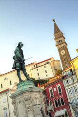 Fototapeta na wymiar Old town Piran with statue of Giuseppe Tartini