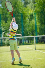Fotobehang Little boy playing tennis © spass