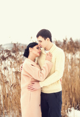 Portrait of young sensual couple in winter