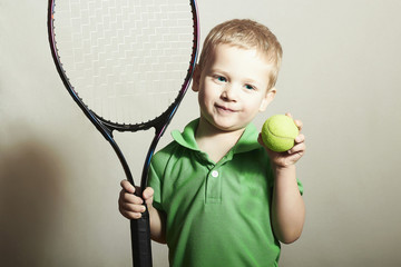 Young Boy Playing Tennis.Sport Children.Tennis Racket and Ball