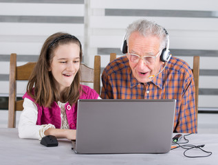 Amazed girl and grandpa