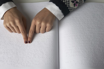 Blind reading text in braille language