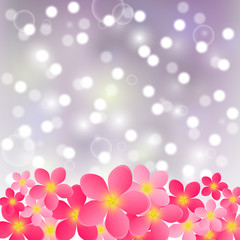 Pink flowers on shiny background