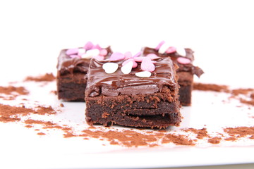 Brownie with chocolate and sugar hearts decoration