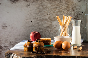 Breadsticks ,Banana cake, milk  and Biscuits with black coffee i