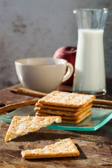 Breadsticks ,Banana cake, milk  and Biscuits with black coffee i