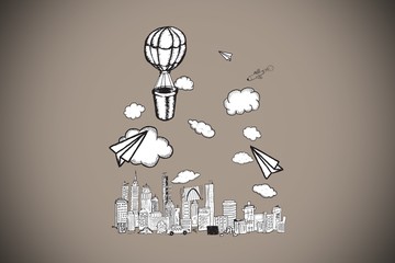 Composite image of hot air balloon over city