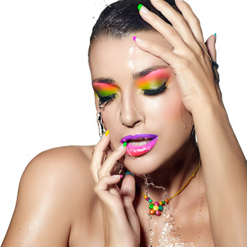 Fashion Girl Portrait. Colorful wet Makeup. Beauty and Fashion