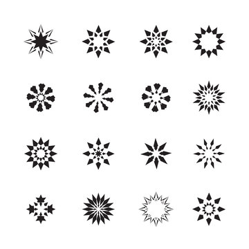 set of black snowflakes and abstract floral icons