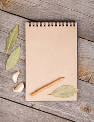 Blank notepad on wooden table