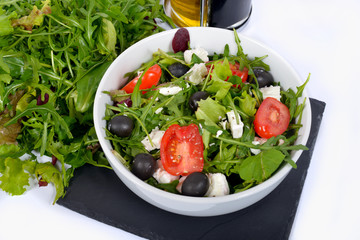 salads with bottle of oil