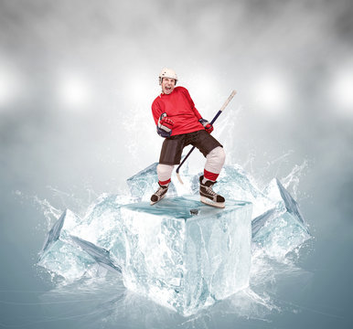 Screaming hockey player on abstract ice cubes background