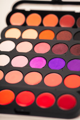 cosmetics. Colorful eye shadows palette. Makeup background