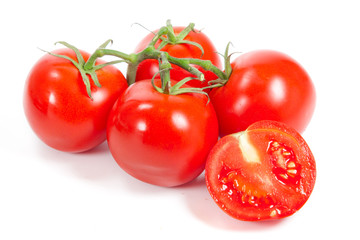 Fresh tomatoes isolated on white