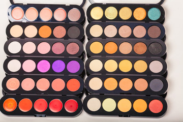 Cosmetics. Colorful eye shadows palette. Makeup background