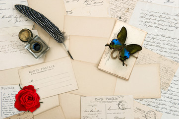 old letters, vintage postcards, rose flower, butterfly
