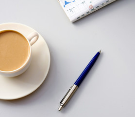 Cup of coffee near press
