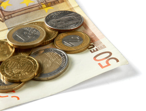 Money: euro coins and bills close up
