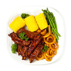 Freshly Grilled BBQ Ribs with Corn