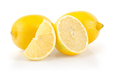 Lemons with Half and Slice on White Background